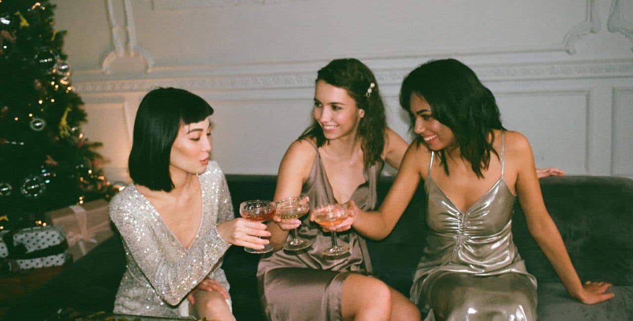 three women toasting with Rancho La Gloria drinks