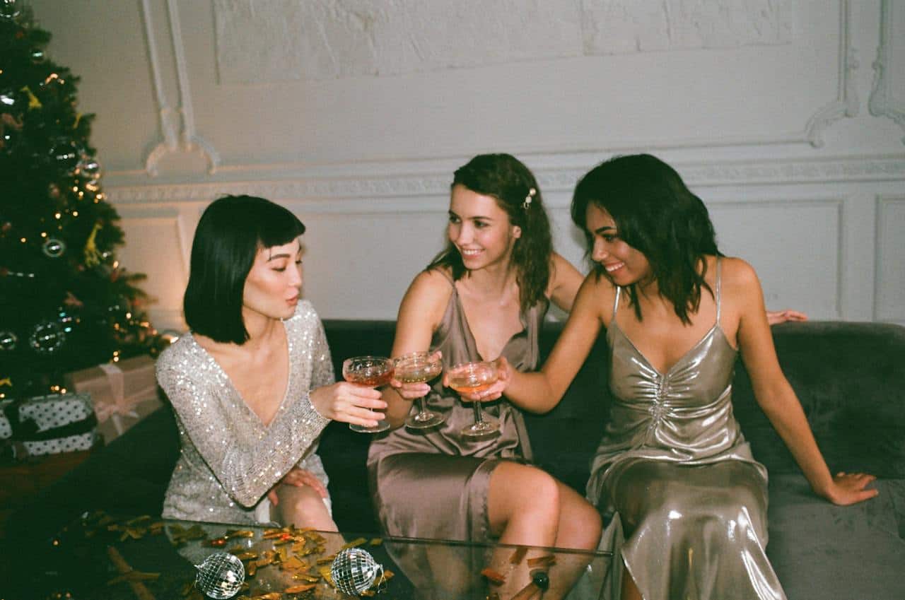 three women toasting with Rancho La Gloria drinks